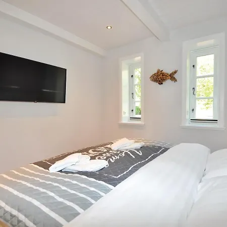 Dom wakacyjny Doppelhaushaelfte Amber House